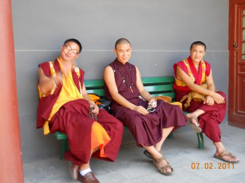 Three happy monks at the Llama Temple in Beijing.