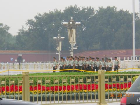 Soldiers marching across Tiananmen Square for the 90th anniversary of the CCP.